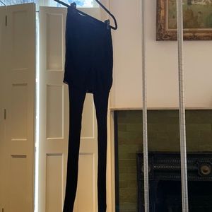 Black shear shorts and pants combination by Alexander Wang, size Medium.